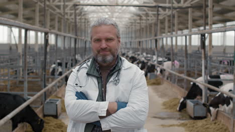 veterinarian posing at dairy farm facility