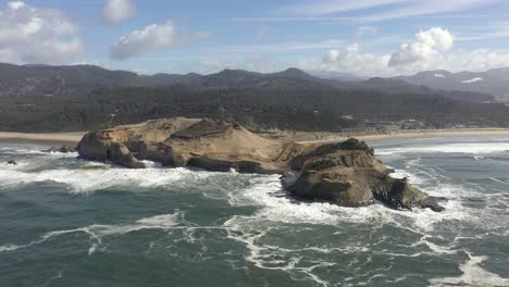 drone flight around the tip of cape kiwanda in pacific city, oregon, usa