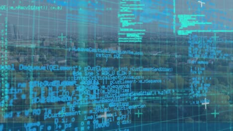 program codes and aerial view of a city