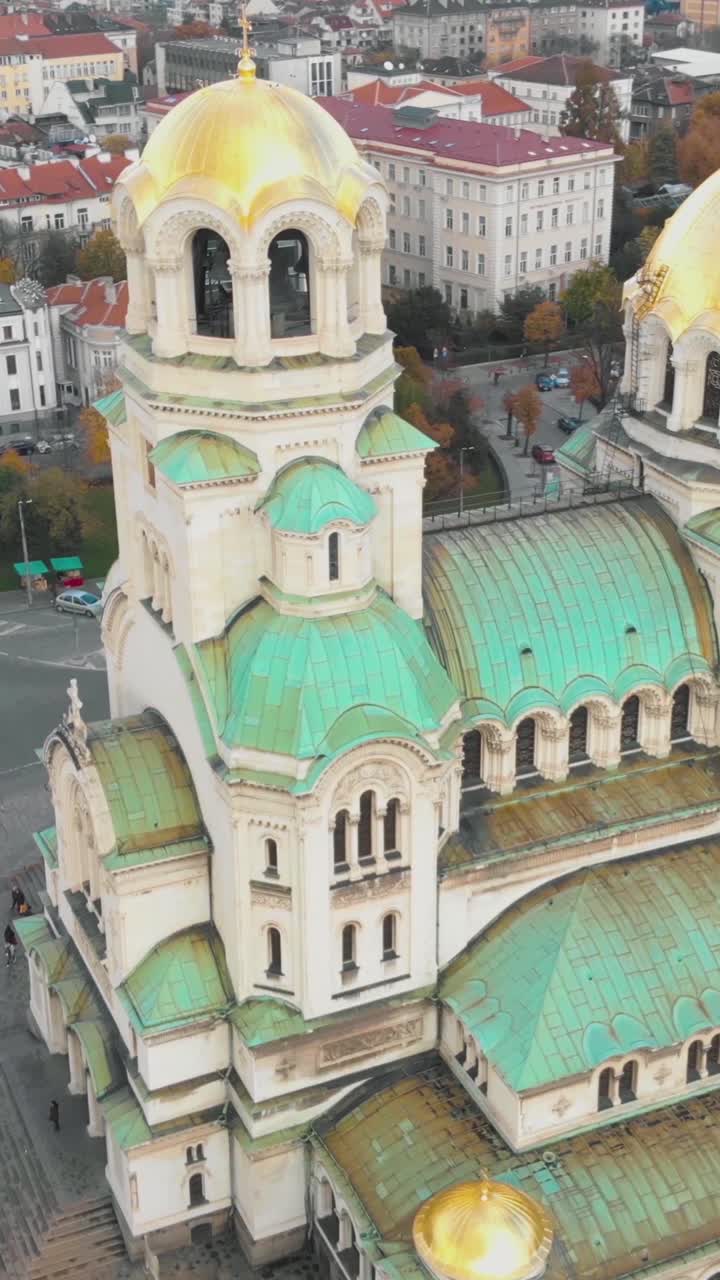 Aerial view of the magnificent green domes of St. Alexander Nevsky Cathedral in Sofia, Bulgaria. Vertical Video