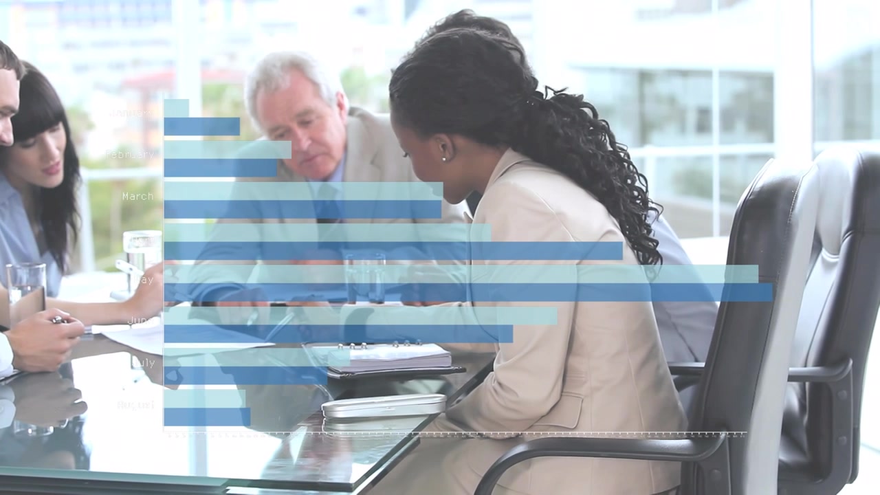 Statistical data processing over diverse businesspeople discussing in meeting room at office