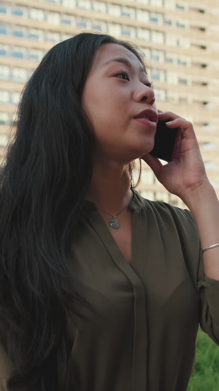 Woman on Phone in Urban Setting