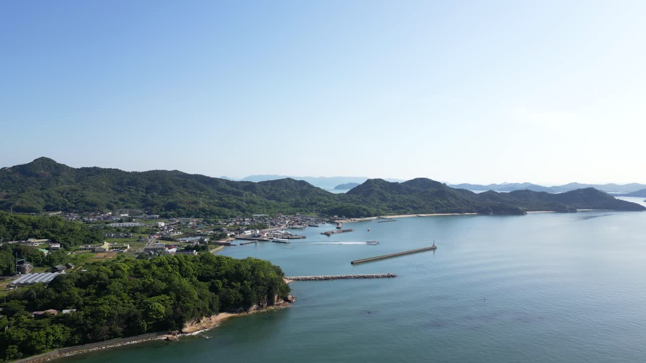 Slow cinematic drone flight over Teshima Art Island in Japanese Seto Inland Sea