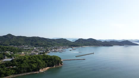 slow cinematic drone flight over teshima art island in japanese seto inland sea