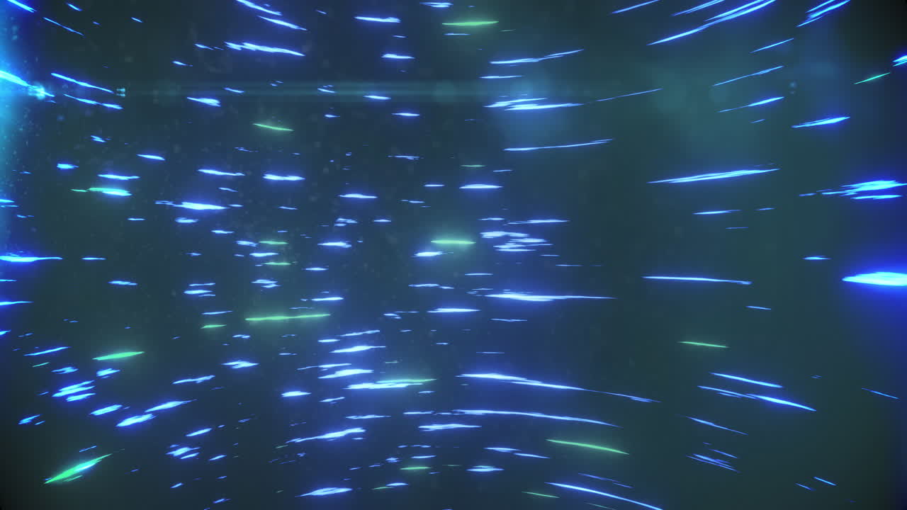 Animation of blue and green light trails spinning against black background