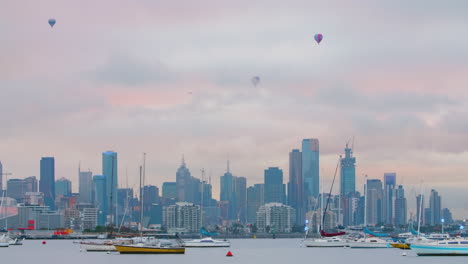 eerie morning sky featuring flying birds and hot air balloons in the clouds