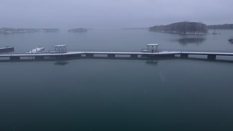 Snow-covered-pier-in-Detroit-River-International-Wildlife-Refuge-Humbug-Marsh-Unit-on-the-Detroit-river,-aerial-drone-view