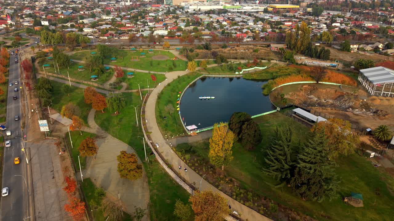 Rancagua city park, lake and autumn trees near santiago, chile, aerial view