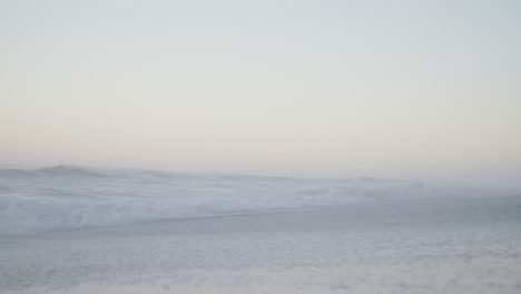 blue sky and sea with waves on empty sunny beach