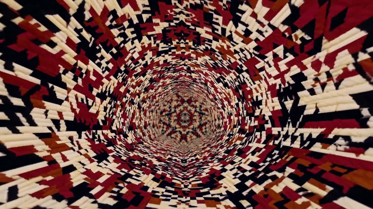 Spiraling view into a vibrant textile pattern, showcasing intricate designs and colors, creating a mesmerizing visual journey through a dynamic motion sequence