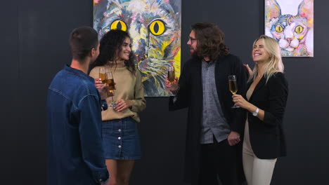 friends celebrating at an art gallery