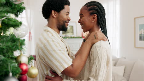 couple in love by a christmas tree