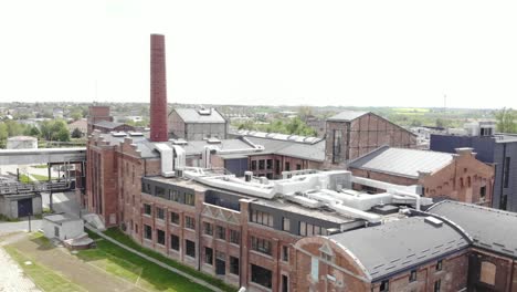 aerial shot of the żnin arche hotel inside old sugar factory in poland