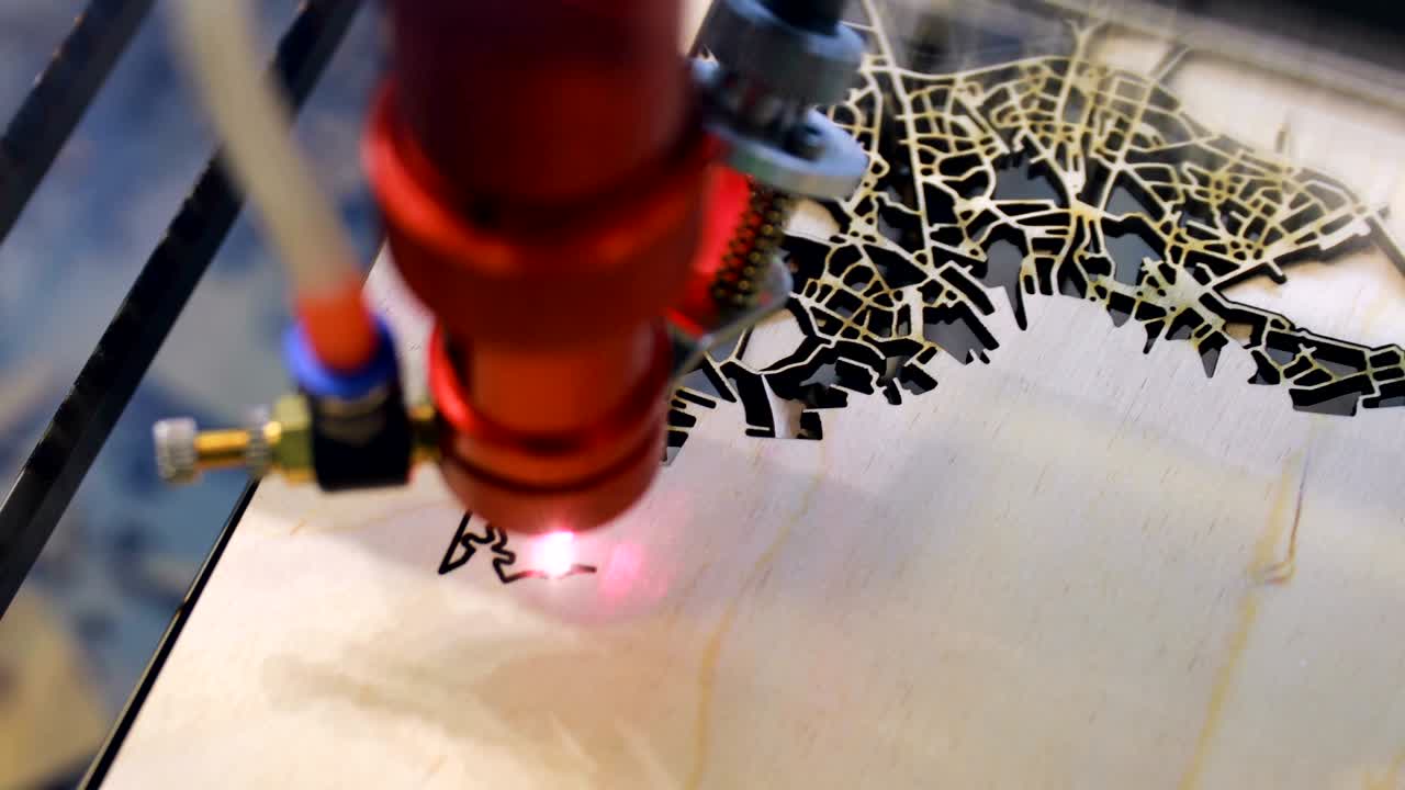 CNC burning laser woodworking wood processing machine, modern technology in the industry.