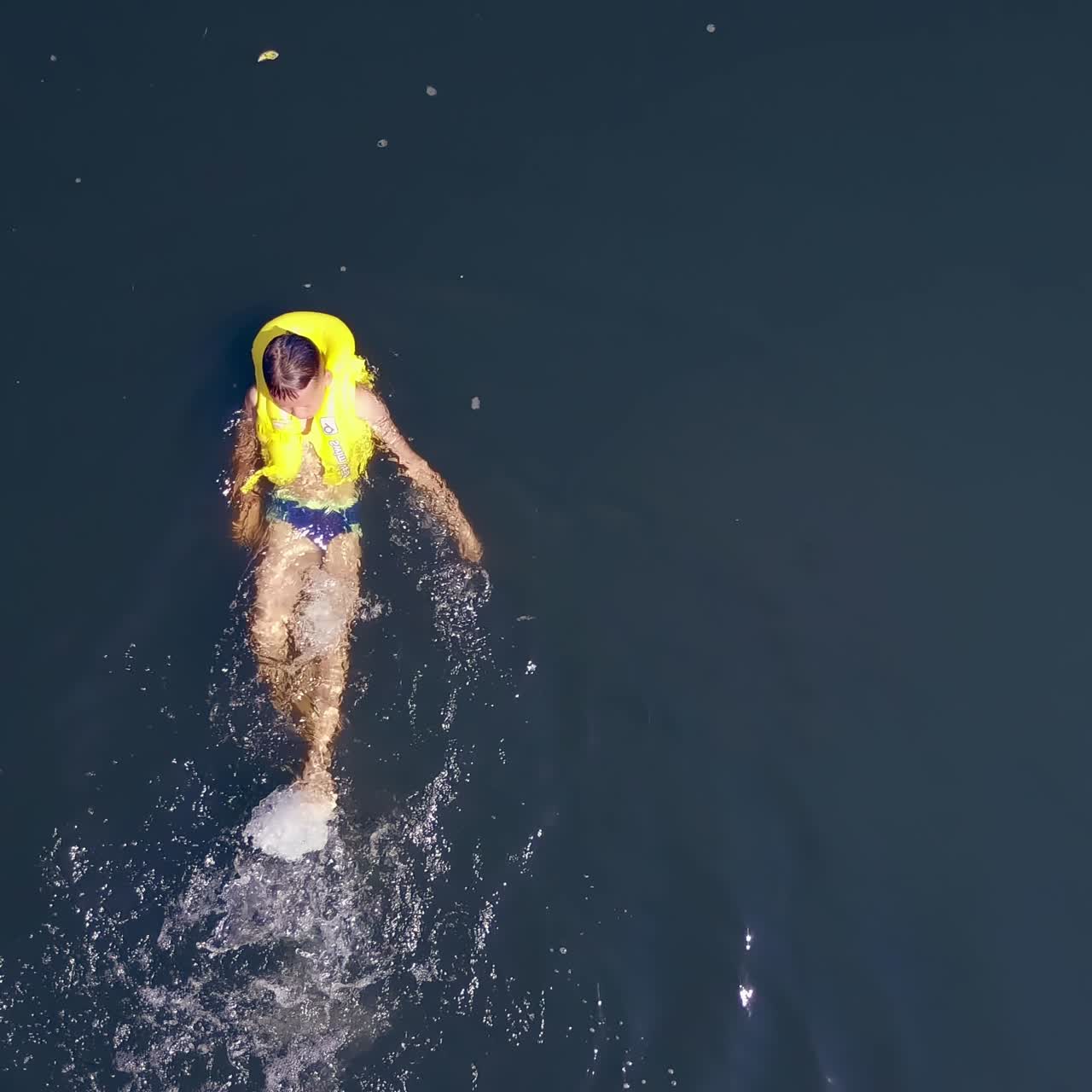 Boy having fun in river