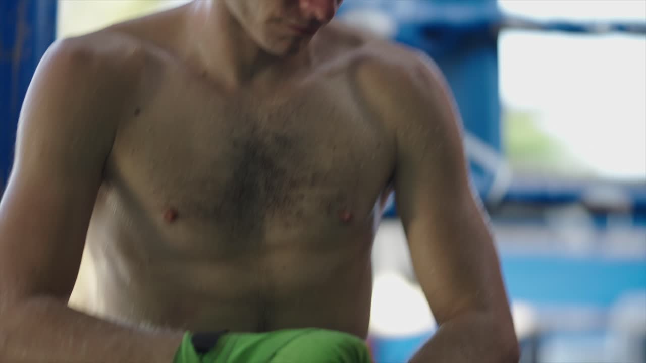 A man preparing for boxing training