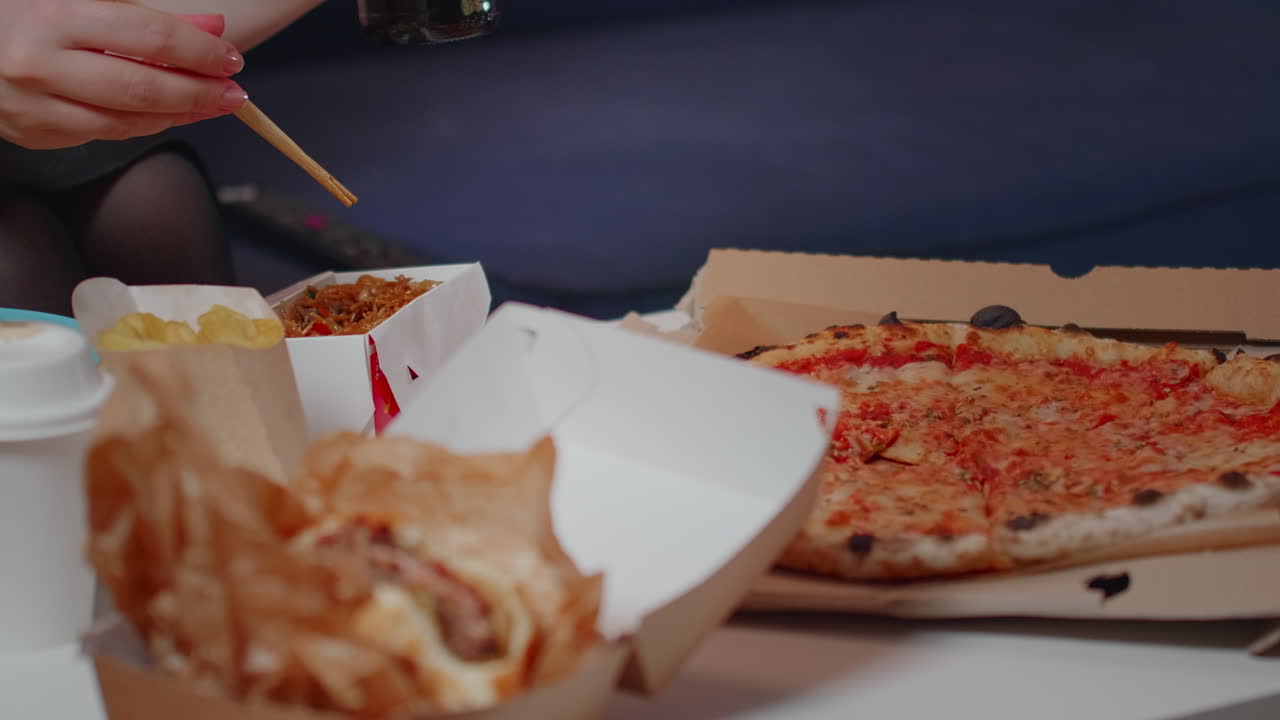 Close up of table with fast food delivery meals