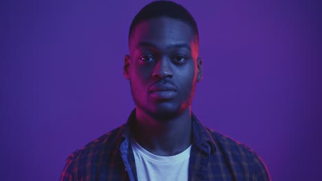 portrait of a man in vibrant lighting