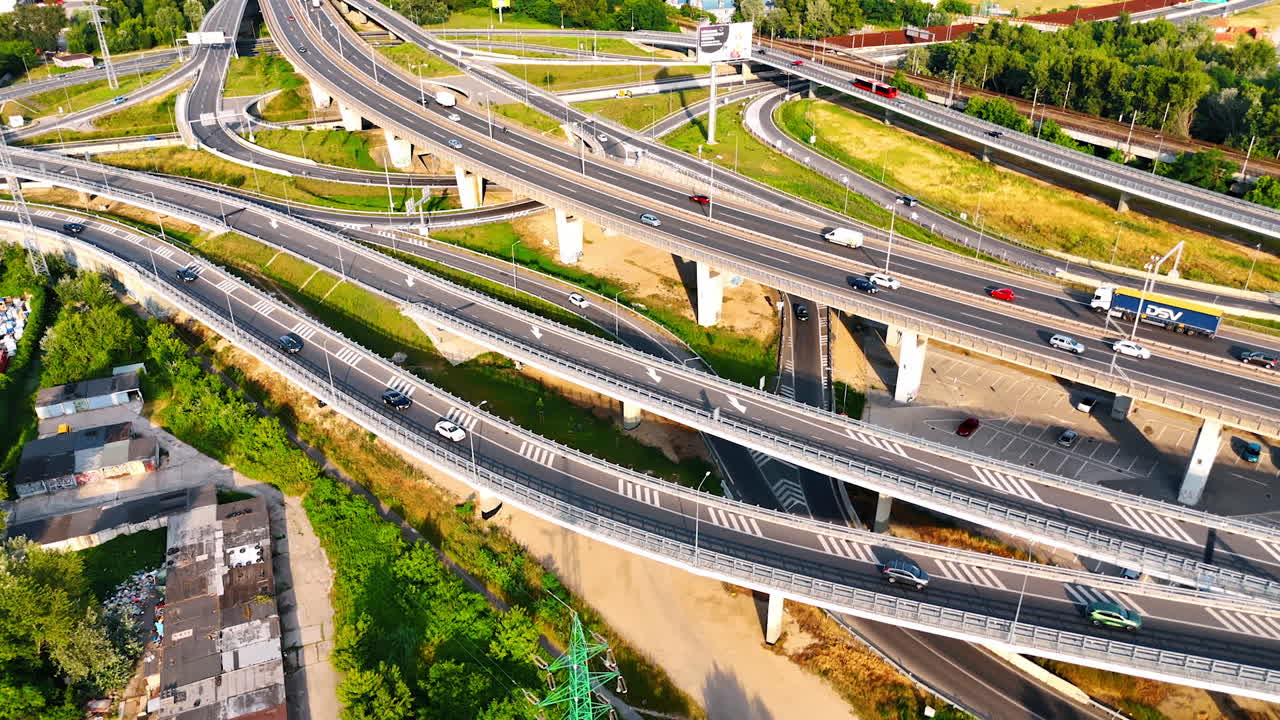 Busy European highway interchange. Aerial view captures the intricate layout of a highway interchange bustling with vehicles in a European city