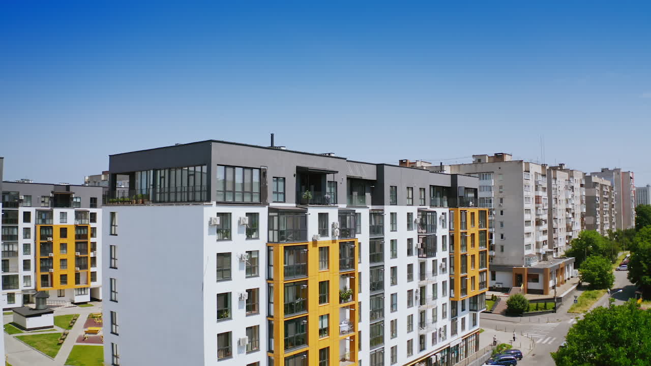 View of new apartment building. Aerial view of modern residential complex for young families