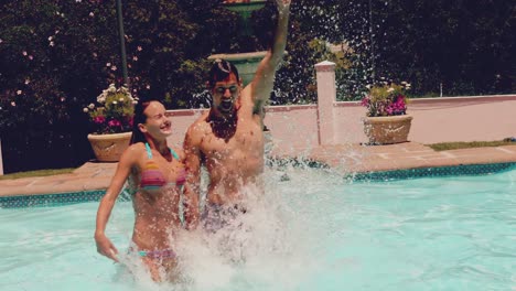 Couple-having-fun-together-in-the-swimming-pool