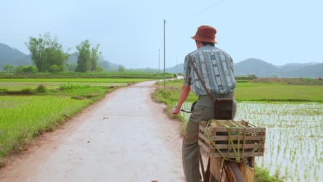 pov driving on rough, rural and closed road between the farmfields at lang son city, vietnam