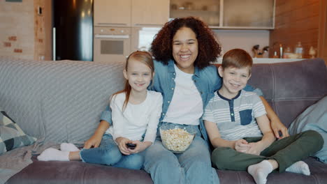 happy family watching movie together