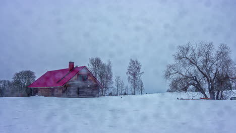 Un-Lapso-De-Tiempo-De-Una-Casa-De-Campo-De-Madera-En-El-Campo-Durante-Una-Tormenta-De-Nieve