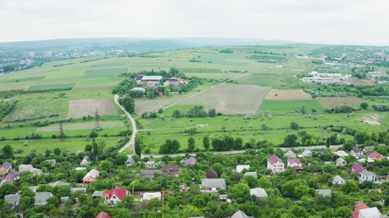 Aerial View of Rural Landscape with Village and Fields