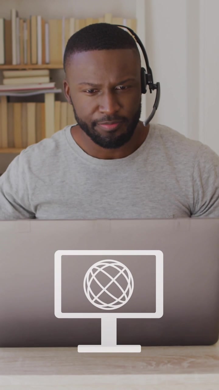 Animação de telas com ícones de globo sobre um homem afro-americano usando um laptop