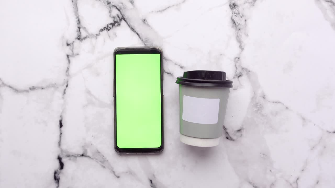 Smartphone and Coffee Cup on Marble Background