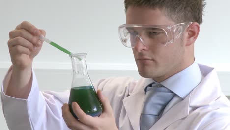 lab technician examining chemical