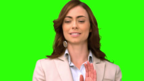 Businesswoman-throwing-a-coin-on-green-screen