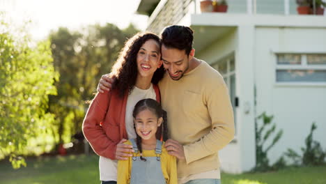 Family-outdoor,-parents-and-child-on-lawn-at-home