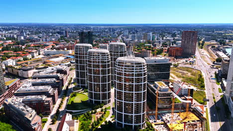 bratislava, slovakia - june 14, 2025: bratislava's modern architecture. high-rise buildings showcase contemporary design in bratislava, blending urban life with green spaces under a clear sky
