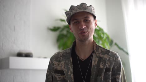 portrait of a man in military fatigues, face to camera