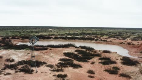 lonely unusable windmill lost in deserted area in aerial view