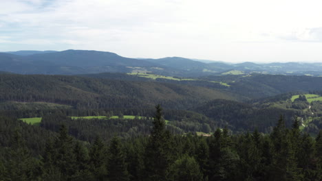 Rising-up,-revealing-the-beautiful-landscape-surrounding-Chata-Paprsek,-Czech-Republic,-aerial