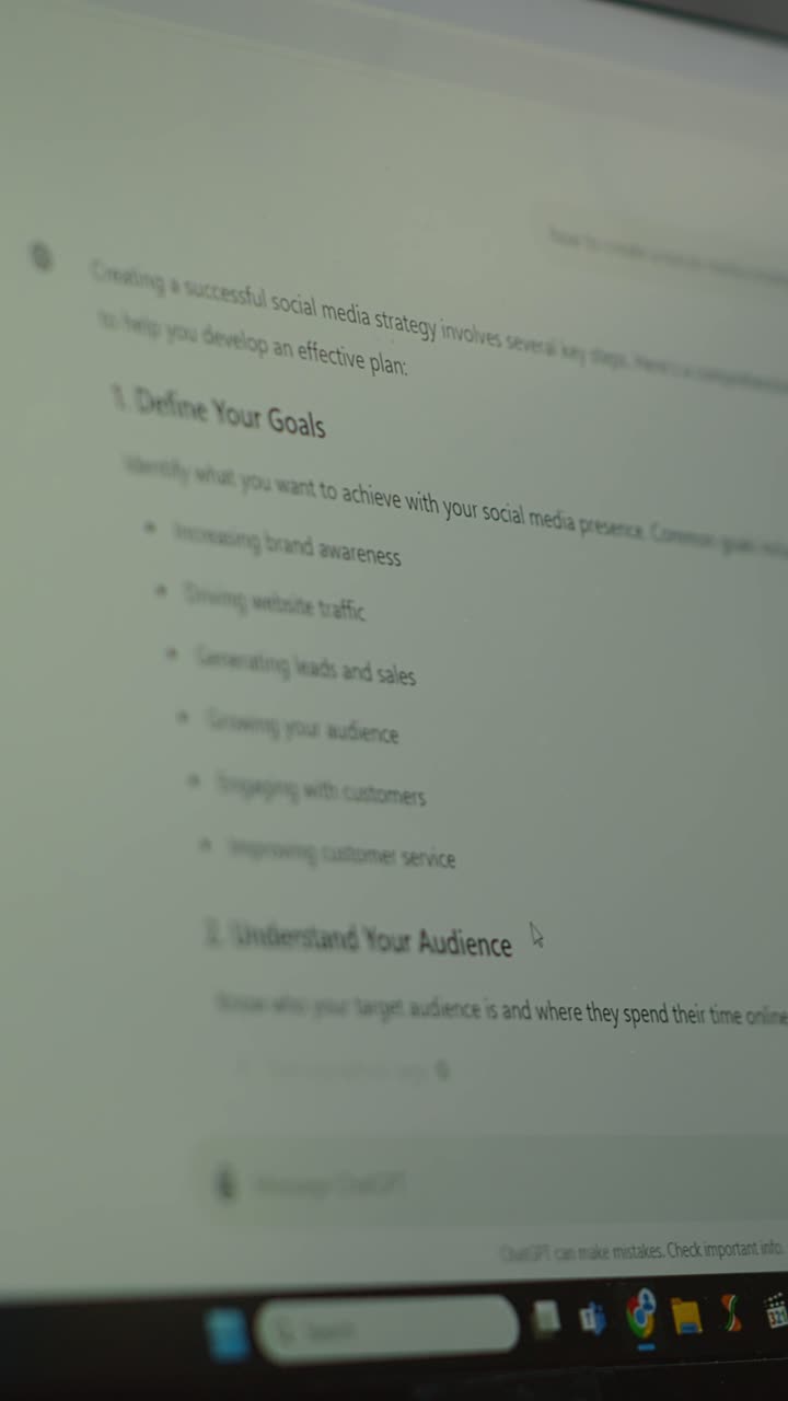 Vertical Video Bucharest, Romania - July 30th 2024 - Person typing into an AI chatbot system