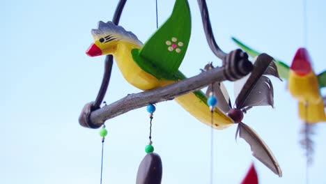 colorful wooden bird wind chime