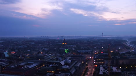 aerial descent of stockholm city center in the evening