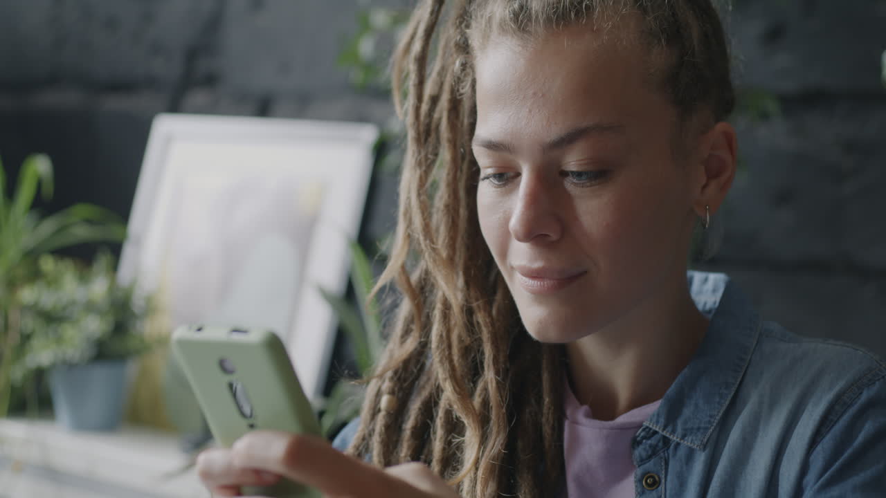Young woman using mobile phone