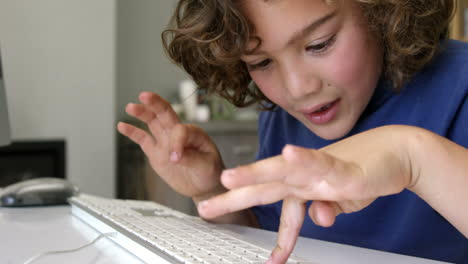 -Happy-son-using-computer-