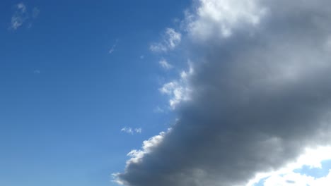 Arcus-Clouds-pass-overhead-on-a-sunny-Autumn-day---Canterbury,-New-Zealand