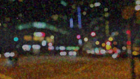 animation of glitch moving over blurred night cityscape