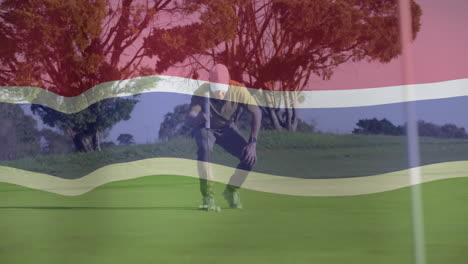 mature golfer crouching on golf green, showcasing ar technology overlay with colorful wavy stripes