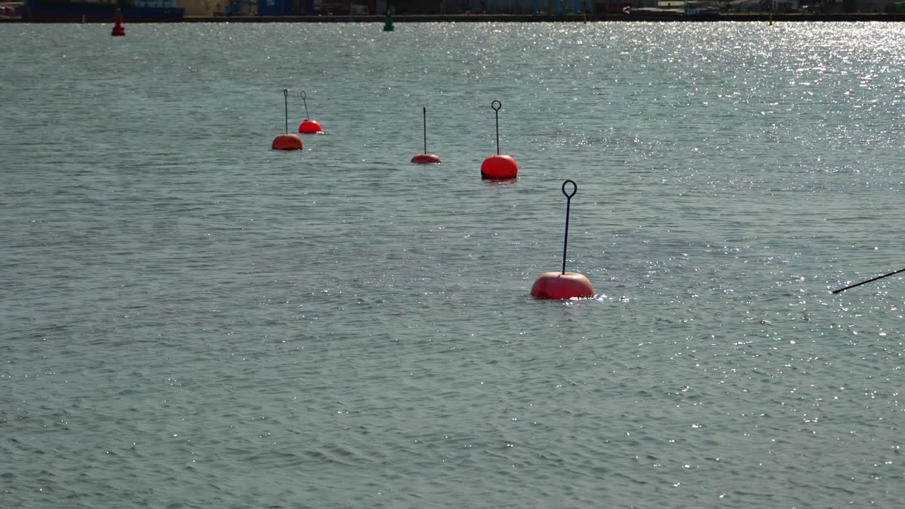 Orange Buoys Marking a Waterway