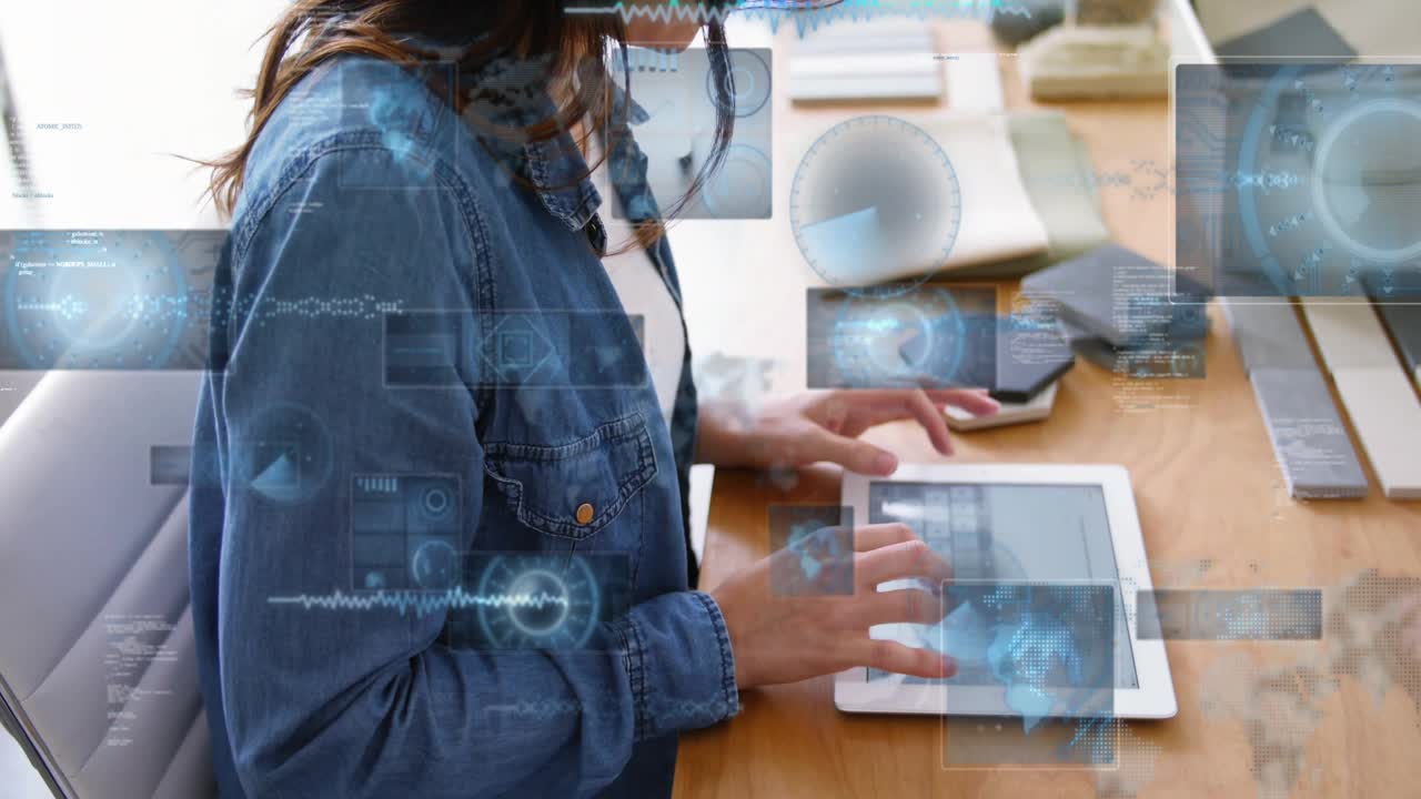 Woman tapping tablet and sparking faint HUD graphics growing, leaning in and analyzing tech data