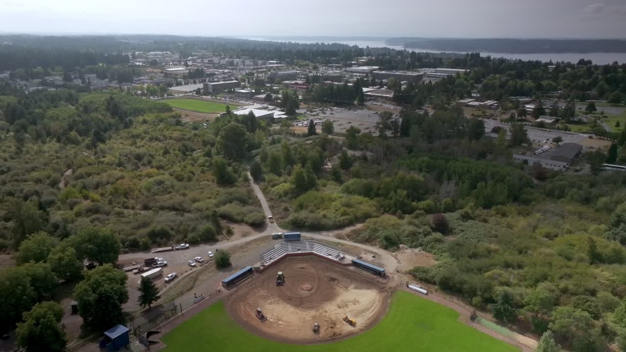Heavy Machinery Resurfacing The Infield Of Minniti Field - Baseball Field In Tacoma Community College In Tacoma, Washington, USA