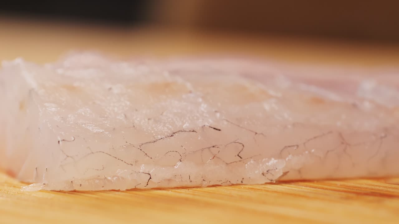 Raw Fish Fillet on Cutting Board